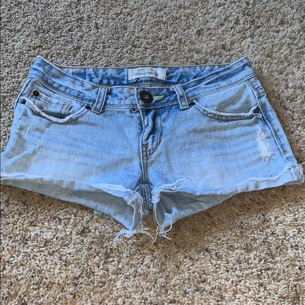 light wash distressed jeans shorts
